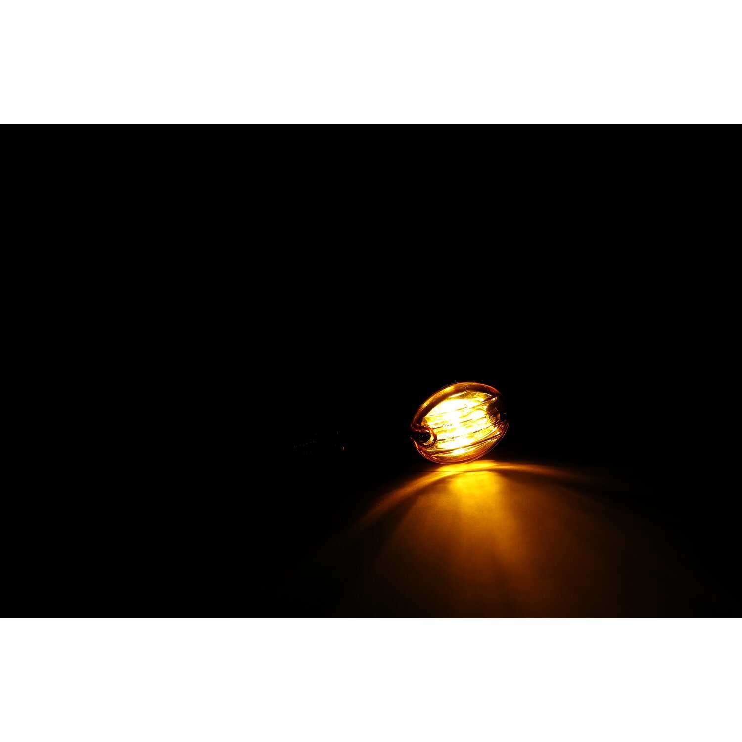 Micro-flash, halogen turn signal. Black. Dark amber lens
