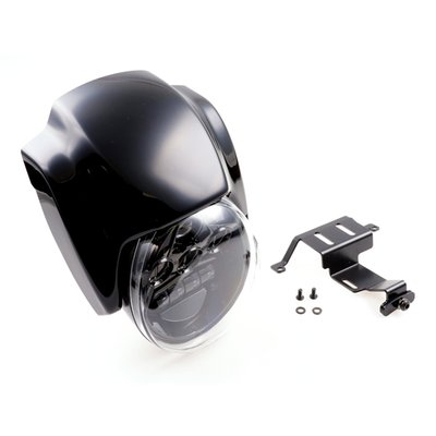 Unpainted gloss black finish. Includes a custom LED headlamp, the OEM headlamp is not re-used.  The custom headlamp remains, like OEM, adjustable. Kit comes with a matte black powder coated CNC laser-cut steel bracket and a high quality ABS plastic mask. Provides a more aggressive look and optically makes the bike lower & longer. Mount holes are pre-drilled and installation is bolt-on to OEM mounting points and compatible with OEM cables and wiring. This comes with approval. 
Note: No modifications required for installation but the LED headlamp must be soldered to the wiring harness of the original headlamp, connector is different. 

Note: Check your local MCS dealer or the MCS sales department for exact type of approval and validity on bike model and years on the test report.