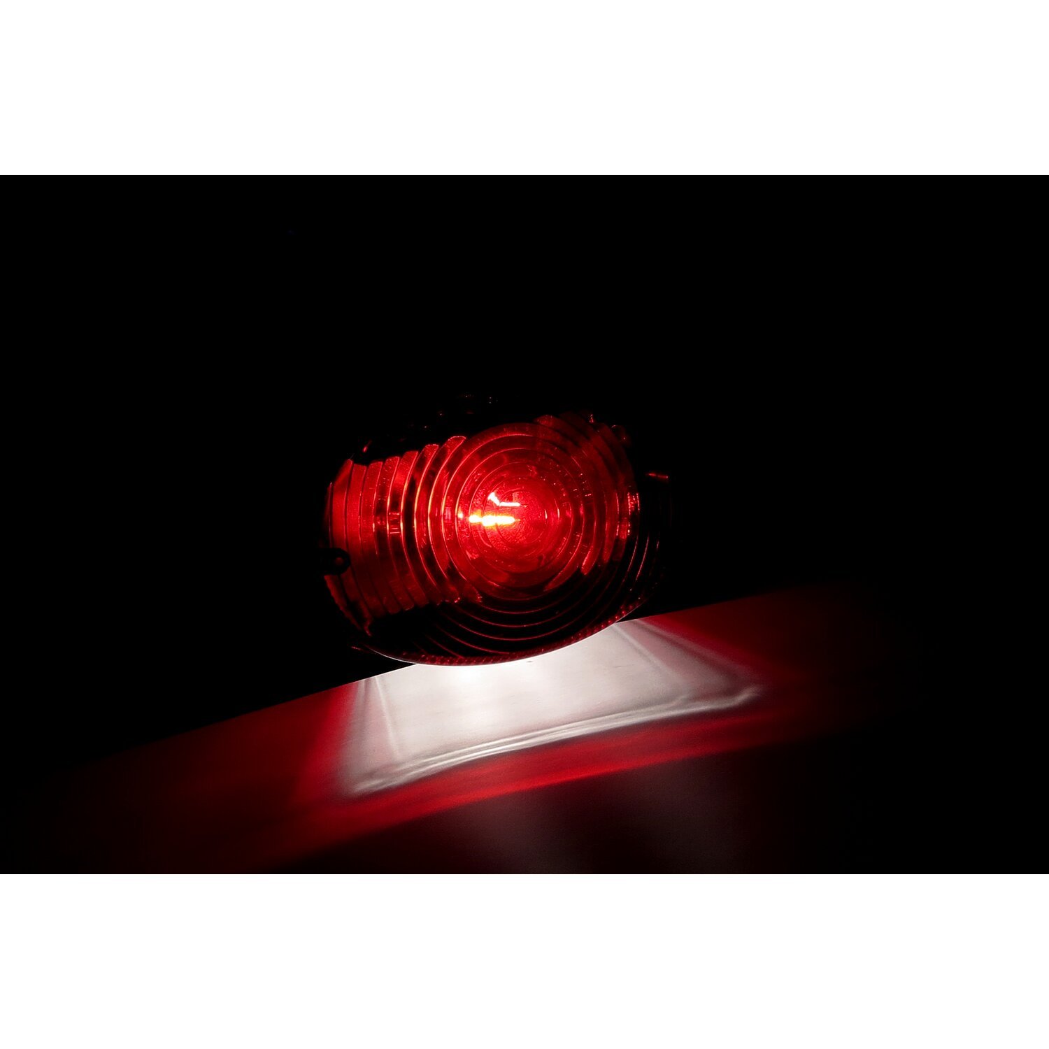 NY oval, taillight. Black. Red lens