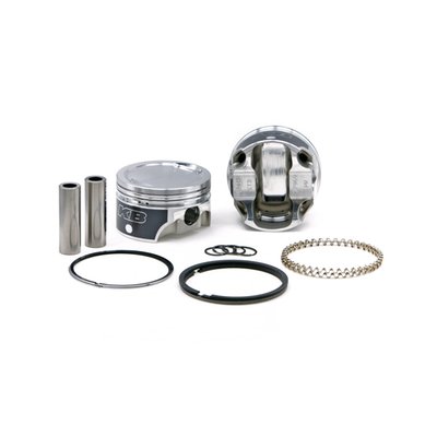 883-1200 conversion forged piston set. 10.1 CR with 51cc head. Works with unmodified 883 heads.
Piston weight 337gr. 
Piston pin weight 97gr. 
Piston pin dia. .791" / offset. 
Head type: Dish with +9.8cc. 
Compression height 1.280". 
Bore 3.498". 
Stroke 3.812". 
Rod length 6.926". 
Cyl. length 4.650". 
All KB forged pistons are made from 4032 alloy, a 11% silicon alloy that is formed in a forging press. Forging aluminum gives a superior strength and structural integrity on a molecular level, after which it is fully machined. The combination of this alloy and the forging process allows the piston to flex under detonation, or pre-ignition, giving the best resistance to cracking. Although 4032 has a low expansion rate, it is higher than the cast Hypereutectic. Therefore forged KB pistons will require about .001" wider piston to wall clearance. Pistons are sold as sets, complete with wrist pin retaining rings, wrist pins and piston rings.
Please note that all KB forged pistons come equipped with offset wrist pins / piston pins. There is a front and rear section on the piston and it is necessary to install it in the correct way. Please refer to the installation instructions, as provided with each piston set, prior to installation.

Note: For 04-up XL models 1200cc cylinders must be used. The stock 04-up 883 cylinder liners are too thin for boring to 1200 size.