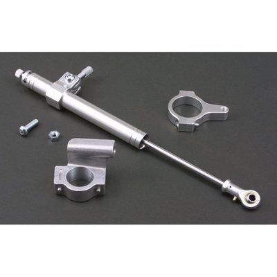 With 41mm fork clamp for 41mm fork tubes.
Silver anodized adjustable aluminum damper. Includes hardware.
Quality fork damper to increase your ride's stability.
Hydraulic steering stabilizers, or fork dampers, offer damping and can give an increase in high speed stability and ultimately help prevent the dreaded speed wobble. Not just for drag or street racers, but regular riding as well.