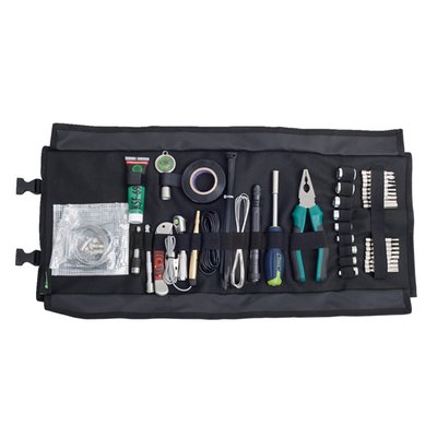 46-piece set. Metric sizes. Your reliable compagnion on short or long trips. 24/7 ready to solve most technical issues or maintenance while on a trip, or at home. 
- 1/4" 50mm long bits: 18 pieces 
- Rachet: 1/4" drive with 60 teeth
- Extension: 100mm 
- 1/4" Bit adapter
- 1/4" Screwdriver bit adapter 
- 12-point sockets with 1/4" drive: 6 / 7 / 8 / 10 / 12 / 13 / 14mm 
- 1/4" drive swivel joint 
- Folding lock blade knife 
- Combination pliers: 160mm long 
- LED flashlight 
- Volt test light: 6 to 24 Volt 
- Universal electrical wire: 2 meters 
- Universal emergency control cable 
- Binding wire 
- 18mm tape 
- 6 x tie-wrap 
- Kukko universal grease 
- Valve cap tool. Clean hands when inflating tires 
- Textile roll bag 
- Weight: 1.6kg