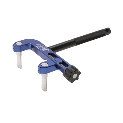 This tool securely holds clutch hubs on most motorcycles and ATVs. It can be used to remove the locking ring on UTV fuel cells to remove fuel pumps 
- Reversible blades work on conventional square spline and on round spline style (KTM/Husqvarna) clutch hubs 
- Aircraft grade billet aluminum body with durable blue anodized finish 
- Precision machined stainless steel blades are strong and durable 
- Billet aluminum clamp knob for fast and easy installation and removal 
- Extended knurled handle provides sure grip when removing or torquing the clutch hub nut 
- Tool jaws have a range of 75mm (2.9") to 120mm (4.72")
