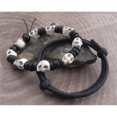 The Stone Skull Bead and Black Para cord double wrap bracelet duo of Amigaz. The Skull bead will fit 7 1/2-8" wrist combo it with the black para cord slide bracelet. The black paracord slider bracelets are made with black paracord (parachute cord) they have a unique "slider" system that is completely adjustable to fit a 6 1/2"- 9" wrist and they are super-wearable, strong, durable and comfortable! Featuring double-wrapped "slider knot" (parachute cord) para cord that is 550 Lb. tested with a 7 Strand Core 5/32 Inches.