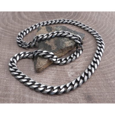 For the guy who is packing attitude, this jewelry collection from AMiGAZ is made for you. The Cuban Distressed tight link chain is a heavy weight Stainless steel chain antiqued brushed finish with fold over clasp 24" this chain is 10mm wide x 4 mm thick and lays flat on neck. This chain has an antiqued brushed finish.  Bold, rugged, and eye-catching with details that are bound to set you apart from the crowd, you'll love the way a simple piece of jewelry can elevate your look and your mood. 