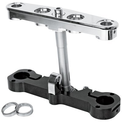 Used to rake the angle of your front fork with 6°, allowing larger than stock wheels to be installed. Designed to be used with 21, 23 and 26 inch wheels. Upper exposed triple tree is chrome plated for the clean look, hidden lower triple tree is black anodized. 

Note 1: When using 21 or 23" front wheels stock length forks (30-1/2") are recommended. 
Note 2: When using a 26" front wheel use 1" shorter (29-1/2") fork tubes to maintain  correct rail. 
Note 3: No cut-out  in the stem for the steering lock.