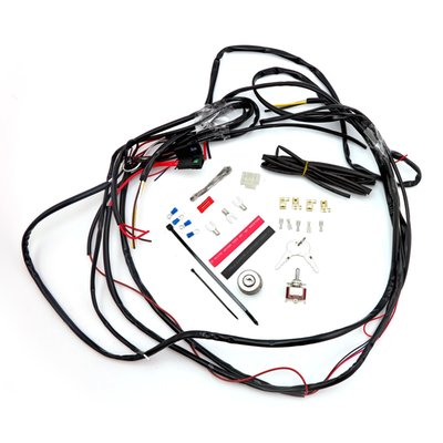 Universal basic wiring harness for custom use. Includes an on/off ignition switch, a hi/low toggle switch, fused circuits and wire ends. It will get a basic chopper up & running with wiring for electric start, headlamp & taillight. No turn signals or indicator light provisions. Complete with a detailed wiring schematic.
Note: See 968177 for on/off replacement ignition switch as supplied with this kit