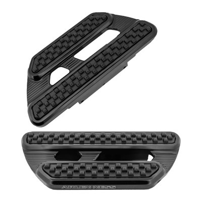 All black anodized. CNC machined billet aluminum construction with 'Arlen Ness' lasered logo on the side. The internal structure of the rubber inlays is specifically engineered to help reduce vibration reduction produced by V-Twin engines.
Dimensions: 8" long x 4.25" wide. For models with passenger floorboard brackets.