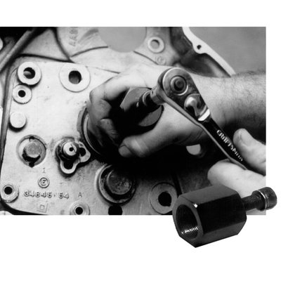 Used to remove the transmission access cover which has a press-fit on two dowel pins