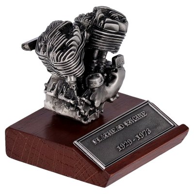 Featuring pewter construction on a wooden display base. Base and motor height: 3-3/8"
