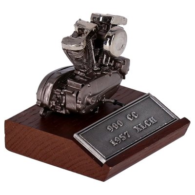 With authentic  1:10 scale 1957 Sportster 900cc details! Fully pewter casted and mounted on a wooden base for display.
Measurements: Length= 4'' Height= 5'' Width= 4''