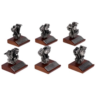 Includes Flathead, Knucklehead, Panhead, Shovelhead, Evolution and TC-88 engines each on it's own wooden base, with a name plaque attached.
Measurements: Flathead with base height= 3-3/8'' Knucklehead model height= 3-1/4'' Knucklehead with base height= 4-1/4'' Panhead model height = 3-9/16'' Panhead with base height= 4-3/8'' Shovelhead model height= 3-5/8'' Shovelhead with base height= 4-7/16'' TC-88 model height= 2-3/4'' Width= 2-1/2''