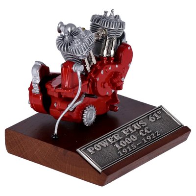 Featuring cast pewter construction on a wooden display base.
Measurements: Length= 5'' Height= 6'' Width= 5''