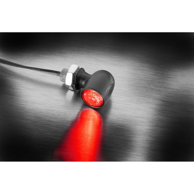 Black. 
Dark lens. 
With an overall length of 14mm, a metal housing diameter of 10mm (1cm) and lens diameter of just 7.8mm the Spot RB is an ultra small taillight that re-defines miniature. Easy to overlook in traffic, you'd say, but the High Output power LED in combination with the special Extranz Extreme Optical Transparency technology actually gives it a colossal light output, when taking in account its tiny dimensions. High quality and ECE compliant so fully street legal. This is The One for those that like a taillight not just small but virtually invisible on a bike, until activated. With M5 x 6.5mm threads.
- ECE-approved for rear use 
- EXtranz® - Extreme Optical Transparency Technology 
- Kellermann HighPower LED Technology 
- Longlife Protection Guard®, IC operated, 330 kHz
- High quality metal housing 
- Suitable for 12 volt DC applications 
- M5x0.5x6.5 threaded 
- Dimensions: Length 14mm, max. diameter 10mm, lens diameter 7,8mm 
- European design protection 
Note: See turn signal section for style & size matching Spot turn signals and position lights. 