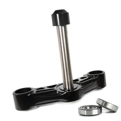 CNC machined billet aluminum with a black anodized finish. The 994312 Wolf bottom clamp is designed to be used with the 984607 Wolf One Top Clamp. Compatible with conventional hydraulic forks, will not fit inverted forks. It allows you to remove your stock plastic Nacelle to have the clean, open look of an inverted front end. The bottom triple tree clamp is an essential part of a performance front end setup. This clamp has been engineered and designed with a broader cross section offering increased axial strength over the stock bottom clamp. The increased surface area of this wide body fork clamps offers excellent hold of your forks giving you peace of mind that your triple tree setup will never fail you. 
- Includes a set of 30mm replacement bearings 
- Mounts directly to your stock 49mm forks 
- Works great with internal fork cartridge kits 
Note: Does not have fastener points to run a stock Nacelle or Batwing fairing.