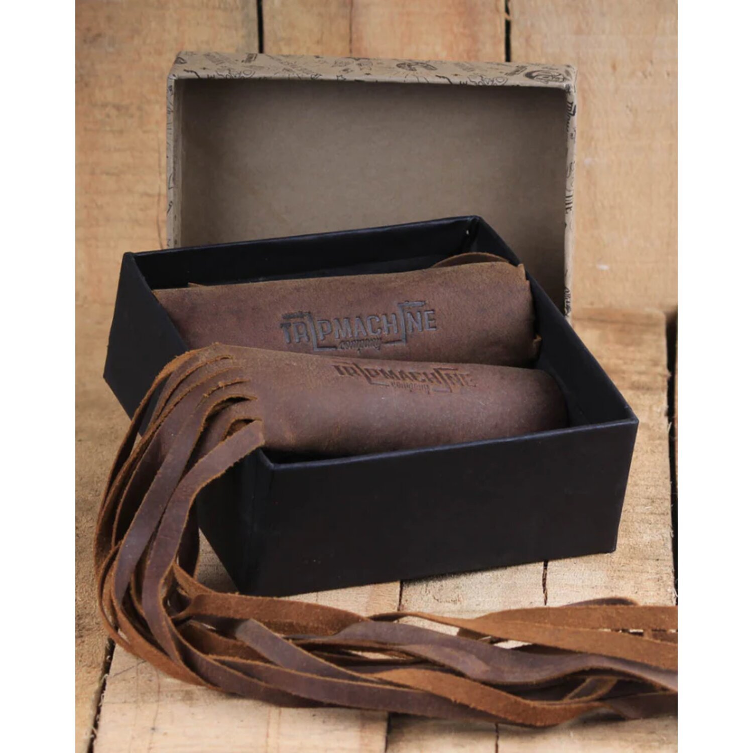 Trip Machine, leather grip tassels