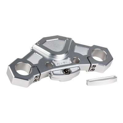 Silver anodized finish. 
With steering lock. 
Direct upgrade replacement for the stock upper (top) triple tree fork clamp. CNC machined from one piece of billet aluminum in the recognizable Vity's Design style. This top clamp is better flex resistant and offers superior strength with an overall reduction in weight. A direct fit for the stock 49mm forks. A perfect base for a front end upgrade and perfect to combine with other style matching Vity's Design products. 