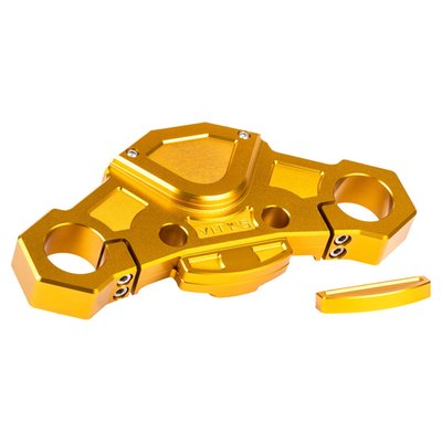 Gold anodized finish. 
Without steering lock. 
Direct upgrade replacement for the stock upper (top) triple tree fork clamp. CNC machined from one piece of billet aluminum in the recognizable Vity's Design style. This top clamp is better flex resistant and offers superior strength with an overall reduction in weight. A direct fit for the stock 49mm forks. A perfect base for a front end upgrade and perfect to combine with other style matching Vity's Design products. 