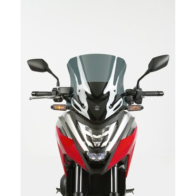 The stock windscreen on the NC750X is what a rider might want for short trips or off-road riding, but if this motorcycle is to be used on the highway for distance riding as well, more protection is needed. Using the stock mounts and adding onto it with specially designed grommets and stand-offs, the VStream windshields are far more effective. 

The cutting-edge VStream’s aeroacoustic contour features a wider profile at the top of the windscreen, which pushes turbulent, noisy airflow to the side and away from the rider’s helmet. This extra width creates a quiet pocket of air, with significantly reduced helmet buffeting for a calmer and quieter ride compared to the stock screen.  

VStream windscreens are made from tough 3.0mm Quantum hardcoated polycarbonate. Our state-of-the-art manufacturing techniques combined with this high-quality material provide these windscreens’ outstanding clarity and strength characteristics unmatched by any windscreen maker worldwide. They are 30X more scratch resistant and have 20X greater crack and impact resistance than other aftermarket windscreens on the market made from commonly used acrylic or "aircraft plastic".  