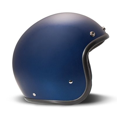 Embrace the fusion of classic style and modern functionality with the DMD Retro helmet, a nod to the iconic 70's design. This helmet isn't just a protective gear but a statement piece, crafted for those who dare to stand out. With its ECE 22.06 approved fiberglass shell available in three sizes, it offers a snug fit. The helmet is bluetooth ready, features integrated snaps for visors, and boasts a luxurious, washable lining with Velcro for a custom fit. Secured with a padded chin strap and a reliable Double D-ring closure, this helmet is the perfect blend of vintage charm and contemporary comfort.