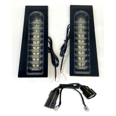 With Run/Turn function. Especially designed for HDI (H-D International = European) models. Designed to fill-in the stock oval cut-out in most H-D Touring fender supports. Each unit features 9 running light pipes and 9 bright amber turn signal pipes, behind an ECE approved smoke lens. Includes a plug & play adapter for quick under-seat installation. 
- 9 red running light pipes 
- 9 bright amber turn signal pipes 
- ECE approved smoke lens 
- Plug & Play installation 
- Sold in pairs. 
Note: See optional 998687 Probeam Fillerz Support Bolt Covers to cover the exposed rear fender support bolts. 