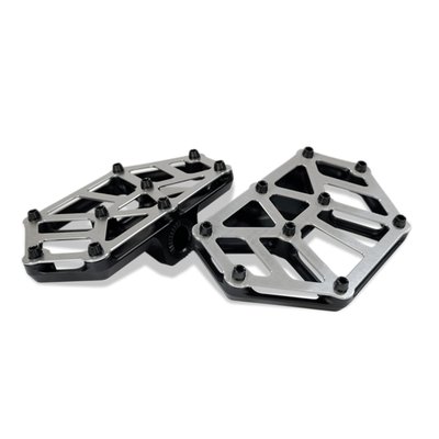 Black anodized CNC machined billet aluminum with brushed Stainless Steel top plate. The contrasting black 'spikes' give excellent no-slip foot grip. A smashing design, ready to lift your bike to the next custom level. 
- Extremely light (0.4 lbs. /  181 grams each) with enhanced foot traction 
- Includes installation hardware 
- Dimensions: 6" long, 3.5" wide, 0.6" thick. 
Note: Model specific floorboard adapters are required & sold separately as: 
- 993866 adapter set rider: 18-25 M8 Softail; 21-25 RH Sportster; 21-25 Pan America; 21-23 Livewire 
- 993868 adapter set passenger: 'Traditional H-D male mount' for use as these NXL Mini floorboards as matching passenger boards for Kodlin 's NXL 997829 rider floorboards for Touring models 
