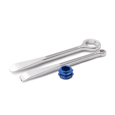 - Tire spoon with axle nut hex wrench and tire spoon hex wrench for rim lock nut set
- Both levers have perfectly contoured tire lever on one end
- One lever has unique combination stepped 10/12 mm box end wrench on other end for turning
rim lock nuts
- Unique no-pinch tip on one lever helps protect inner tube during tire installation
- Second wrench has hex box wrench for 30 mm axle nuts on other end
- Made from lightweight forged 7075-T6 aluminum
- Hard anodized finish
- Under 10 inches in length and weigh only 3.5 oz.
- Hex ends for axle nuts are rated for a maximum torque of 90 lb/ft