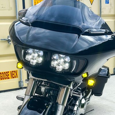 ECE, DOT & SAE approved. Shark Demon LED headlamps offer high-performance illumination, specialized for motorcycle on road use with unmatched beam pattern and durability. Low beam projects 11,314 raw/5554 effective lumens from six projection-style LEDs. High beam adds eight additional direct-reflective LEDs boasting an impressive 22,274 raw/8634 effective lumens total. Side facing position lights further increase viewing angle and width of beam pattern for ditch-to-ditch illumination. Lamp assemblies are completely sealed IP67, waterproof with clear polycarbonate lens and gloss black aluminum housing. Includes 3mm thick 304 gloss black stainless steel mounting brackets, plug and play wire harness, and mounting hardware. 
- Plug & Play 
- ECE approved 
- Unmatched beam pattern 
- Side facing position lights 
- Includes wiring harness, mounting brackets & hardware. 
Note: Larger aftermarket amplifiers require 998682 Fairing Spacer Kit, which must be purchased separately. 
Note: When installing with fairing vent lights, modification is required. 