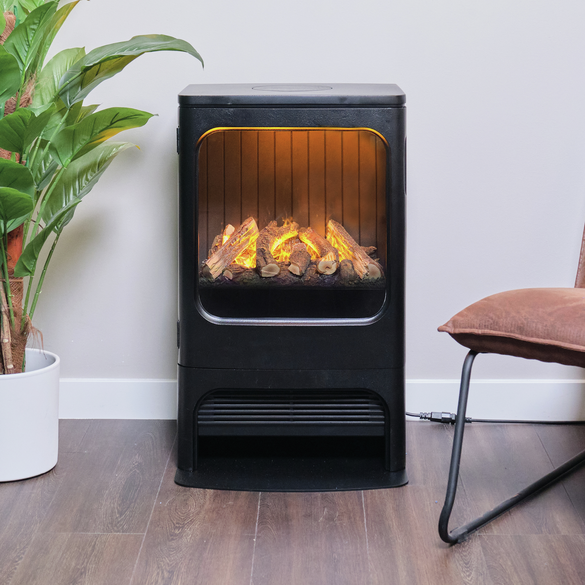 Compacte gietijzeren haard met Optimyst® en 3-zijdig glas.