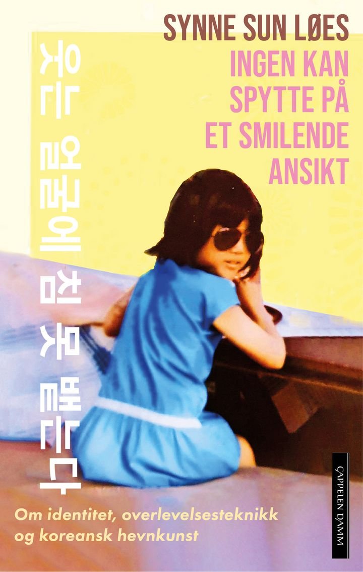 Ingen kan spytte på et smilende ansikt - om identitet, overlevelsesteknikk og koreansk hevnkunst : essay